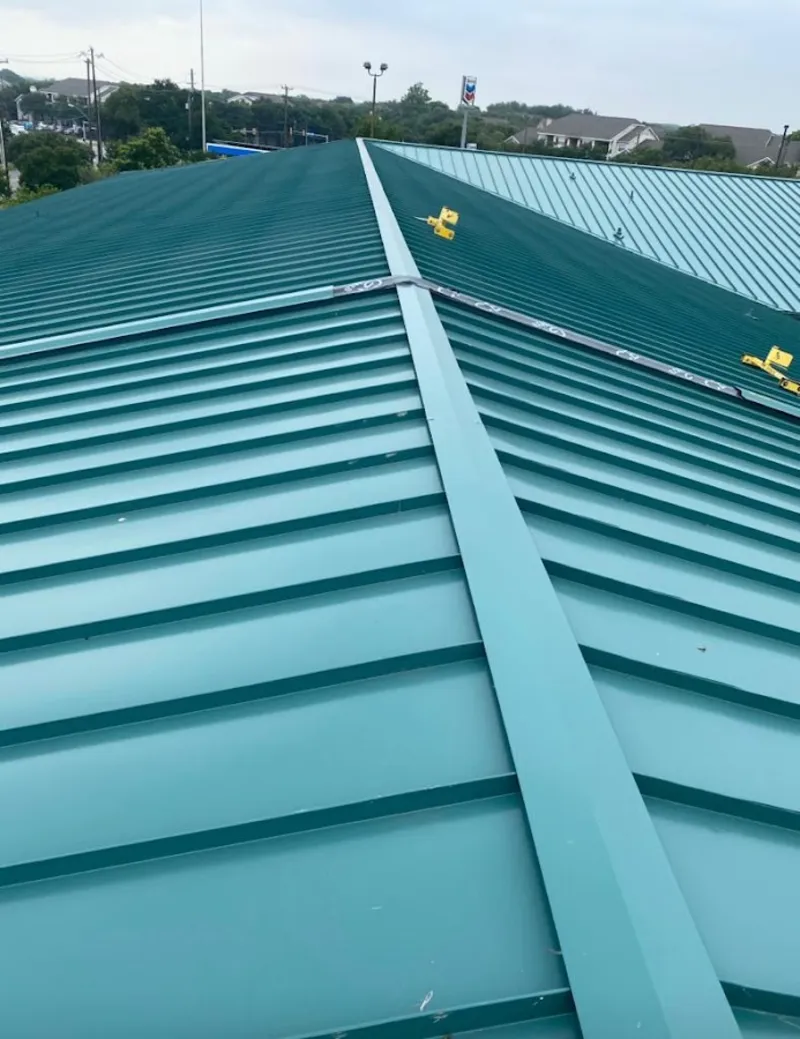 Green commercial metal roof ridge and valley for Metal Roof Repair in Forestdale