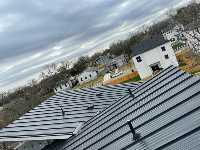 Standing seam metal roof panels with vents for Skylight Repair in Forestdale